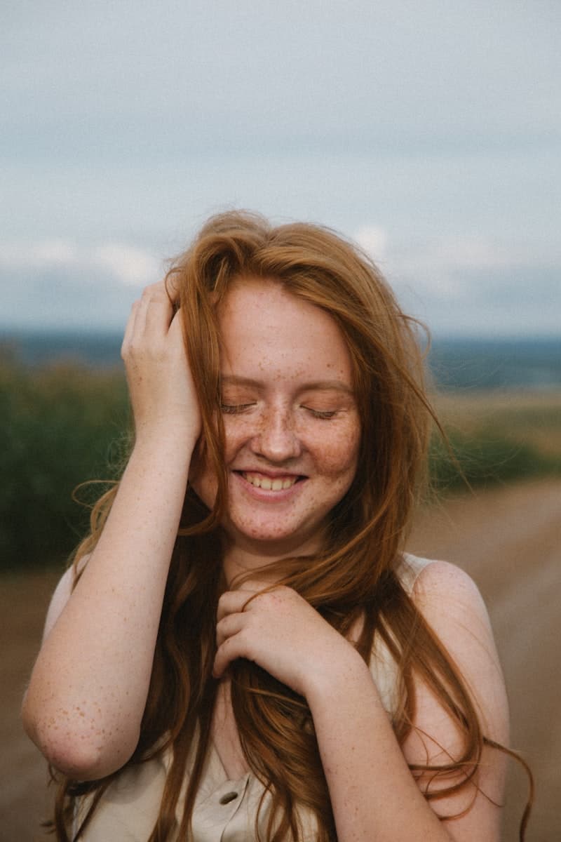 Smiling woman outdoors enjoying a healthy active lifestyle